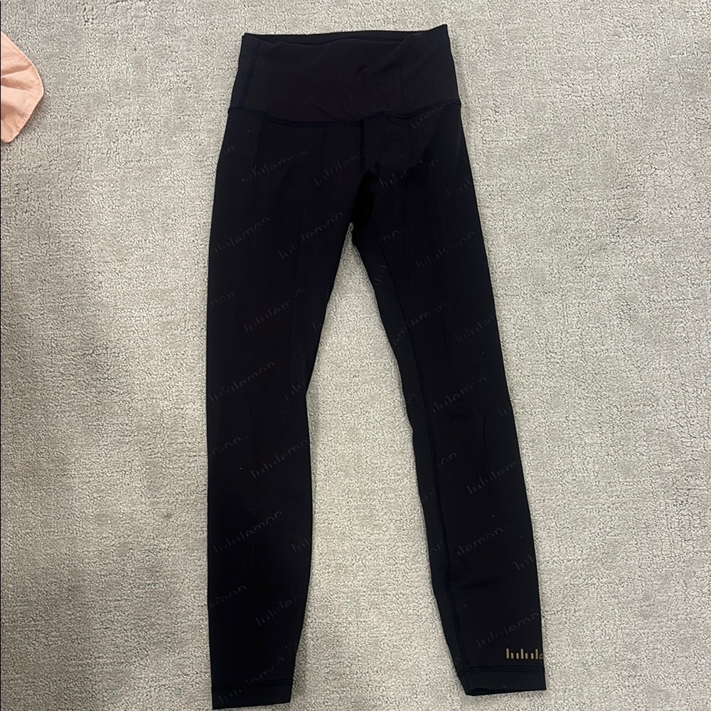 Lululemon Black Leggings with Gold Logo